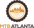 Logo for MTB Atlanta features a circular design with a city skyline and "SORBA" in the center, resembling bicycle tire spokes. The colors are gold and brown. "MTB Atlanta" is written below.